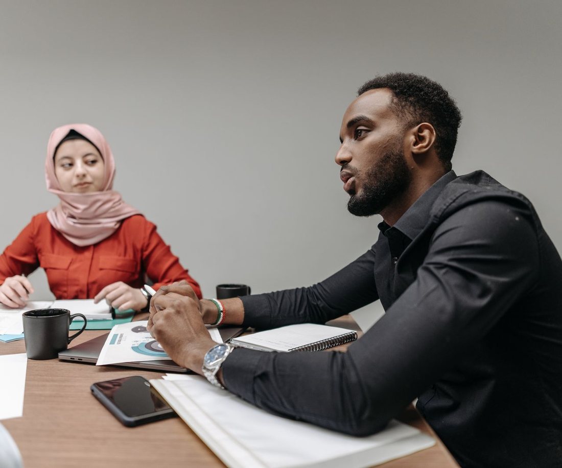 Researchers reviewing data together at a table